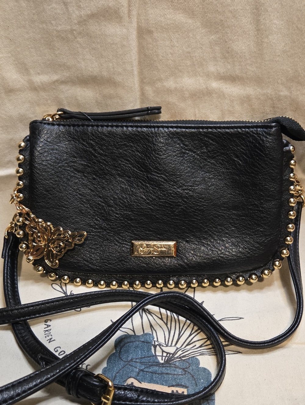 Jessica Simpson Black Crossbody Bag Butterfly Charm Gold Stud Zip